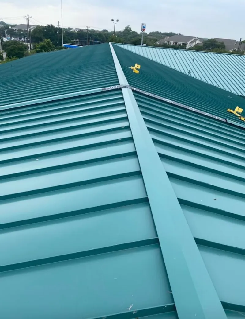 Green commercial metal roof ridge and valley for Metal Roof Repair in Tipton